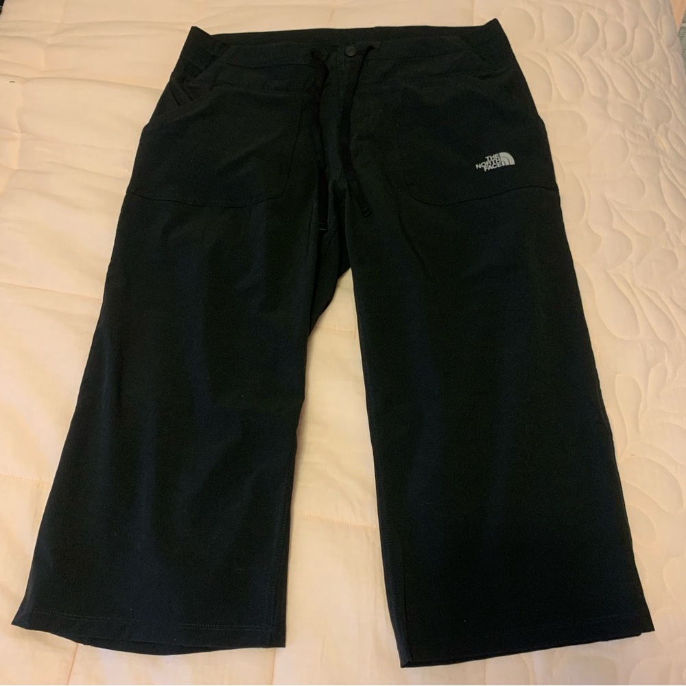 The North Face black M capri pants with snap, zipper and drawstring waist nylon